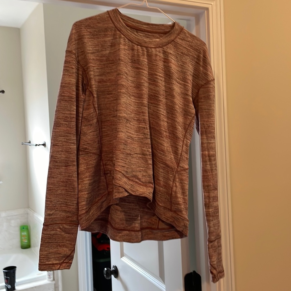 Lululemon long sleeve shirt. Size 8. Wore twice perfect condition.